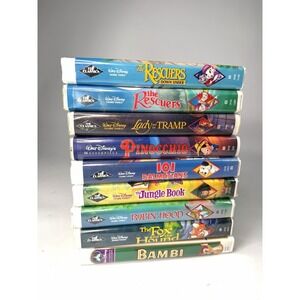 Lot Of 9 Vintage Disney VHS Clamshell Tapes Classic Masterpiece Robin Hood Bambi
